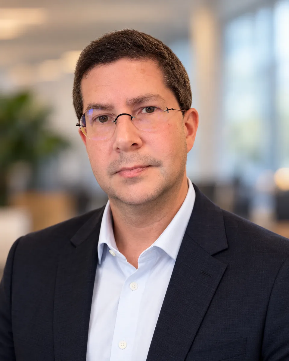 Professional headshot of Ryan M. Kurtz
